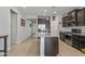 Spacious kitchen with granite island and dark cabinetry at 20138 W Madison St, Buckeye, AZ 85326