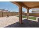 Covered patio with view of backyard at 20138 W Madison St, Buckeye, AZ 85326