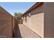 Gravel pathway and gated side yard at 20138 W Madison St, Buckeye, AZ 85326