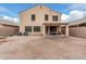 Two story house with backyard patio at 20475 N Herbert Ave, Maricopa, AZ 85138