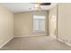 Bright bedroom with large window and ceiling fan at 2150 W Alameda Rd # 1251, Phoenix, AZ 85085