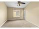 Well-lit bedroom with ceiling fan and window blinds at 2150 W Alameda Rd # 1251, Phoenix, AZ 85085