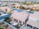 Aerial view of house and surrounding neighborhood at 21556 S 215Th Pl, Queen Creek, AZ 85142