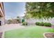 Artificial turf, patio, and landscaping at 21556 S 215Th Pl, Queen Creek, AZ 85142