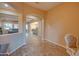 Entryway with view to living room and kitchen at 21556 S 215Th Pl, Queen Creek, AZ 85142