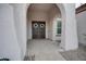 Front entry with arched walkway and double doors at 21556 S 215Th Pl, Queen Creek, AZ 85142