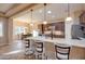 Breakfast bar with three stools in a kitchen at 21556 S 215Th Pl, Queen Creek, AZ 85142