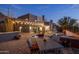 Outdoor dining area with a view of the pool and mountains at 2208 E Belmont Ave, Phoenix, AZ 85020