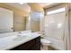 Clean bathroom, featuring a shower/tub combo and dark wood vanity at 24710 N 27Th Pl, Phoenix, AZ 85024