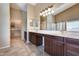 Elegant Primary bathroom with dual sinks and large mirror at 24710 N 27Th Pl, Phoenix, AZ 85024