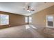 Well-lit bedroom with large windows and neutral wall colors at 24710 N 27Th Pl, Phoenix, AZ 85024