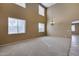 Large dining area with high ceilings and lots of natural light at 24710 N 27Th Pl, Phoenix, AZ 85024