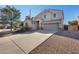 Two-story house with a large driveway and landscaping at 24710 N 27Th Pl, Phoenix, AZ 85024