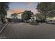 Landscaped front yard with drought-tolerant plants and gravel at 24710 N 27Th Pl, Phoenix, AZ 85024