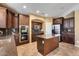 Kitchen with dark wood cabinets and granite counters at 24710 N 27Th Pl, Phoenix, AZ 85024