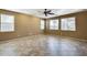 Bright living room with tile floors and ceiling fan at 24710 N 27Th Pl, Phoenix, AZ 85024