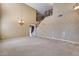 Two story living room with high ceilings and chandelier at 24710 N 27Th Pl, Phoenix, AZ 85024