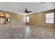 Spacious living room featuring tile floors and high ceilings at 24710 N 27Th Pl, Phoenix, AZ 85024