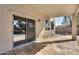 Covered patio with sliding glass doors and pool views at 24710 N 27Th Pl, Phoenix, AZ 85024