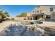 Luxury backyard with a pool, spa, and spacious patio at 24710 N 27Th Pl, Phoenix, AZ 85024