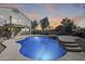 Large kidney-shaped pool with a stone spa and waterfall at 24710 N 27Th Pl, Phoenix, AZ 85024