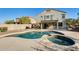 Backyard oasis featuring a pool, spa, and patio area at 24710 N 27Th Pl, Phoenix, AZ 85024