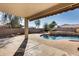 Relaxing patio area overlooking a beautiful pool at 24710 N 27Th Pl, Phoenix, AZ 85024