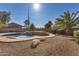 Inviting kidney-shaped pool with a spa and rock waterfall feature at 24710 N 27Th Pl, Phoenix, AZ 85024