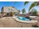 Stunning kidney shaped pool with a built in spa at 24710 N 27Th Pl, Phoenix, AZ 85024