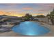 Stunning kidney-shaped pool with built-in spa and waterfall feature at 24710 N 27Th Pl, Phoenix, AZ 85024