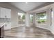 Bright kitchen nook with large windows and golf course views at 25037 S Ribbonwood Dr, Sun Lakes, AZ 85248