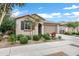 Single-story home with a two-car garage and nicely landscaped front yard at 25422 S 228Th St, Queen Creek, AZ 85142