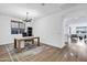 Light-filled home office with wood floors and built-in shelving at 25422 S 228Th St, Queen Creek, AZ 85142