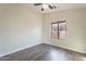 Bright bedroom with wood-look floors and large window at 2727 N Price Rd # 22, Chandler, AZ 85224