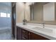 Modern bathroom with double vanity and tiled floors at 29306 N 70Th Way, Scottsdale, AZ 85266