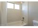 Clean bathroom with shower/tub combo and subway tile at 29306 N 70Th Way, Scottsdale, AZ 85266