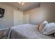 Relaxing bedroom with closet and patterned bedding at 29306 N 70Th Way, Scottsdale, AZ 85266