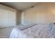 Spacious bedroom with double doors leading to closet at 29306 N 70Th Way, Scottsdale, AZ 85266