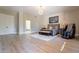 Bright bedroom with hardwood floors and ensuite bathroom access at 29306 N 70Th Way, Scottsdale, AZ 85266