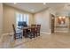 Spacious dining area with wood table and chairs at 29306 N 70Th Way, Scottsdale, AZ 85266