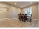 Elegant dining room with wood table and chairs at 29306 N 70Th Way, Scottsdale, AZ 85266