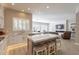 Modern kitchen with white cabinets, stainless steel appliances, and large island at 29306 N 70Th Way, Scottsdale, AZ 85266