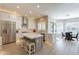 Modern kitchen with white cabinets, stainless steel appliances, and large island at 29306 N 70Th Way, Scottsdale, AZ 85266