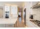 Open concept kitchen with island and stainless steel appliances at 29306 N 70Th Way, Scottsdale, AZ 85266