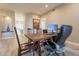 Home office with a large wood table and comfortable chair at 29306 N 70Th Way, Scottsdale, AZ 85266