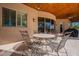 Covered patio with seating area, tile flooring, and ceiling fan at 29306 N 70Th Way, Scottsdale, AZ 85266