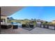 Outdoor oasis with a pool, built-in grill, and breathtaking mountain views at 29360 N 108Th Pl, Scottsdale, AZ 85262