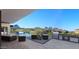 Outdoor oasis with a pool, built-in grill, and stunning mountain views at 29360 N 108Th Pl, Scottsdale, AZ 85262