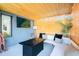 Cozy covered patio with modern furniture, a stylish ceiling, and decorative elements, perfect for year-round enjoyment at 2942 N 81St Pl, Scottsdale, AZ 85251