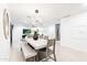 Bright dining room features a concrete table and bench seating at 2942 N 81St Pl, Scottsdale, AZ 85251